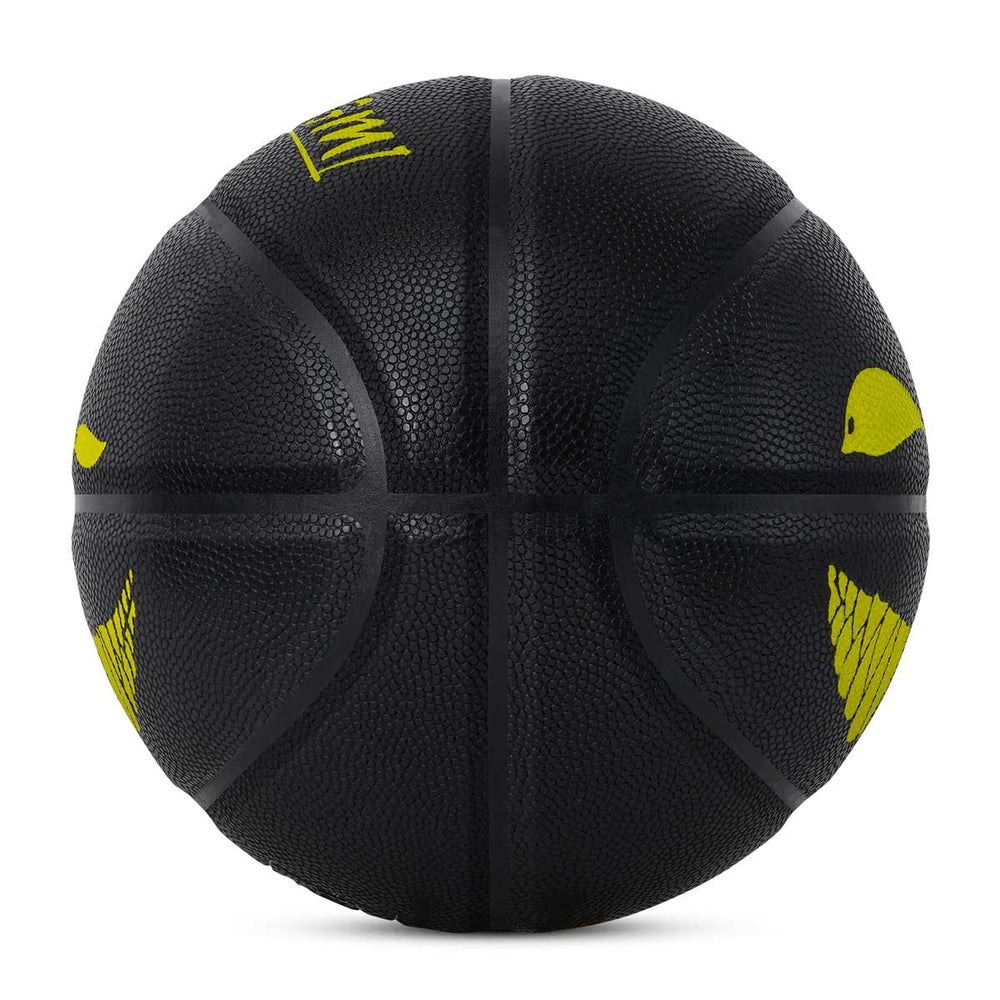 A side view of Kuangmi Devil Smiley Luminous Basketball that is not glowing during the day